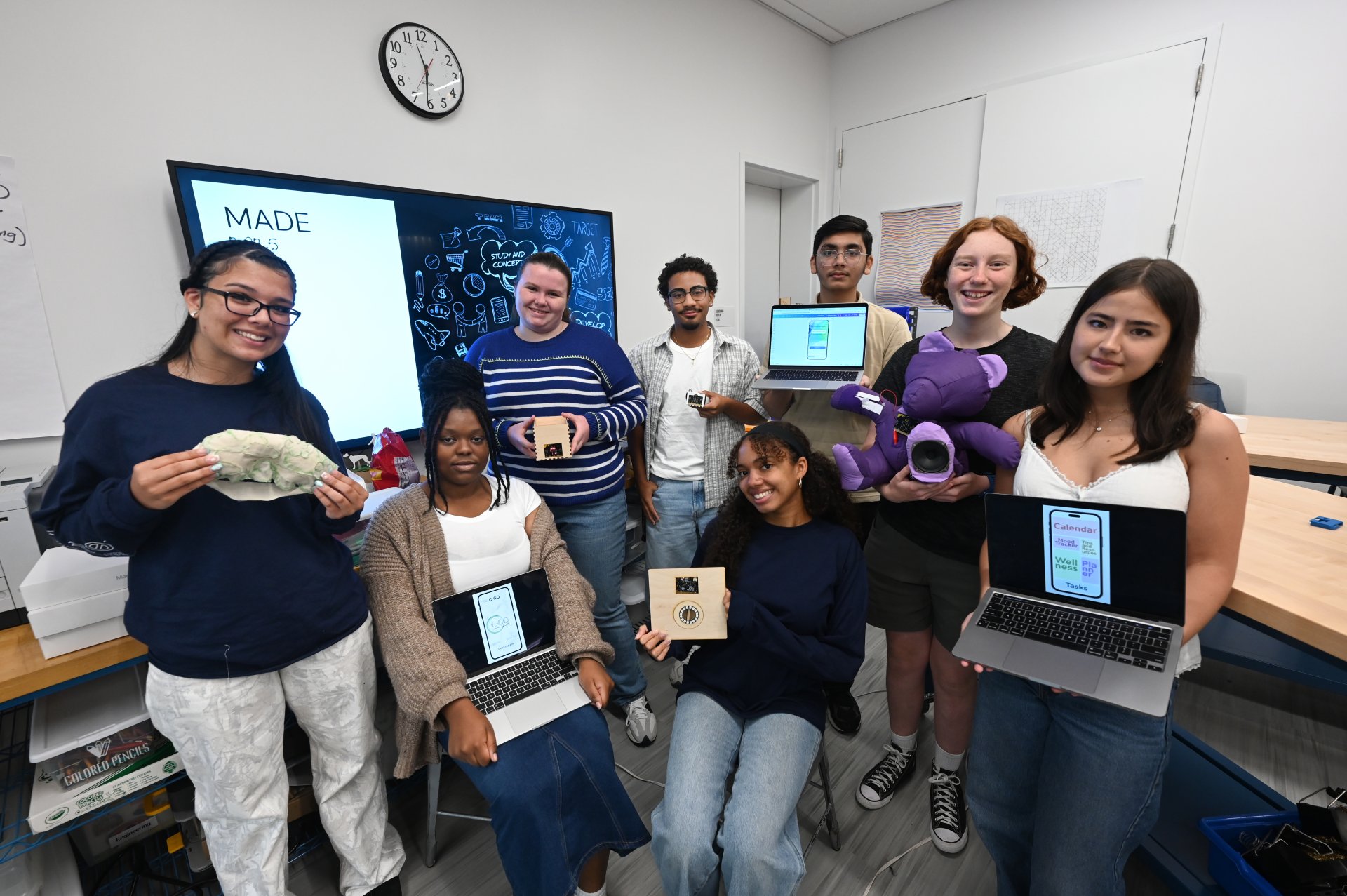 group of students posing at Hackathon event
