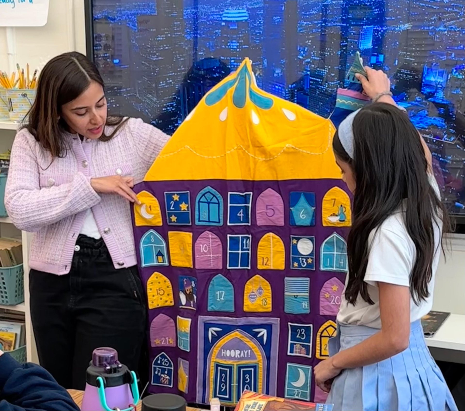 teacher and student with an educational calendar