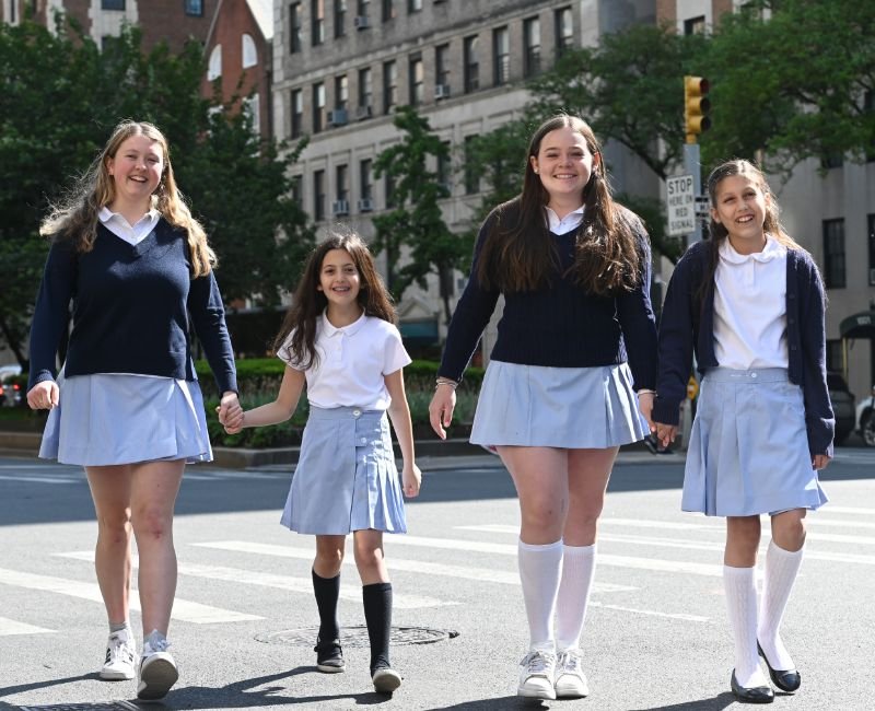 four students walking in NYC