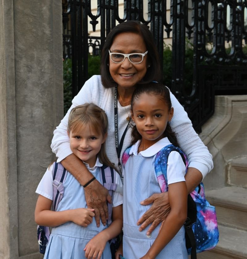 Marymount teacher with two lower school students