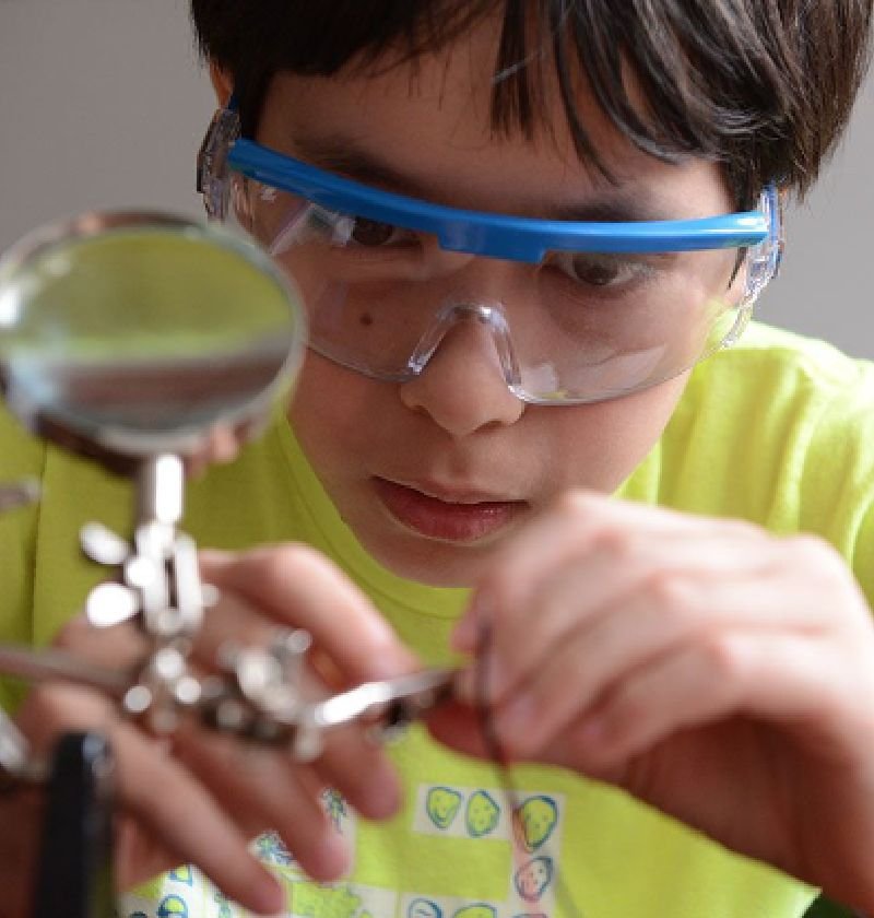 student in science class