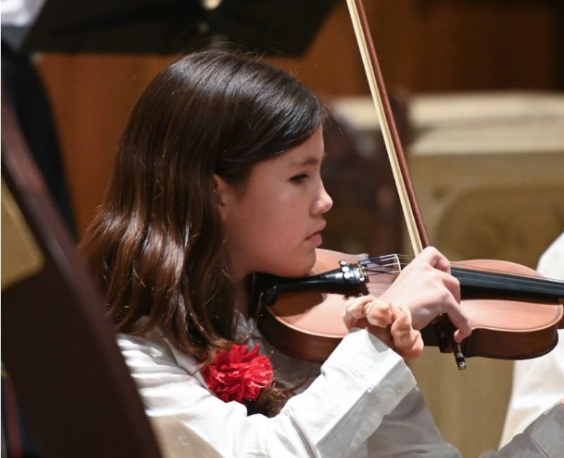 upper mid student playing violin