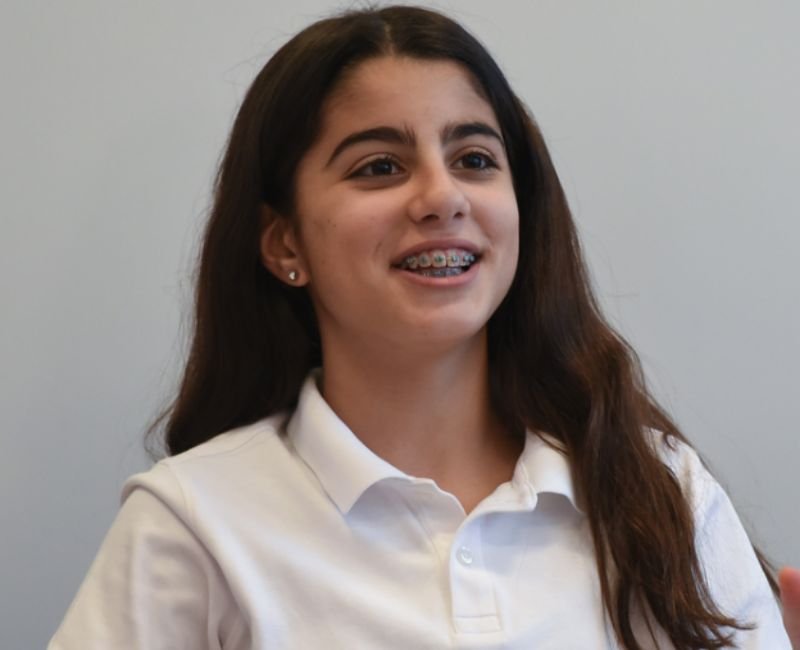 upper mid student in class